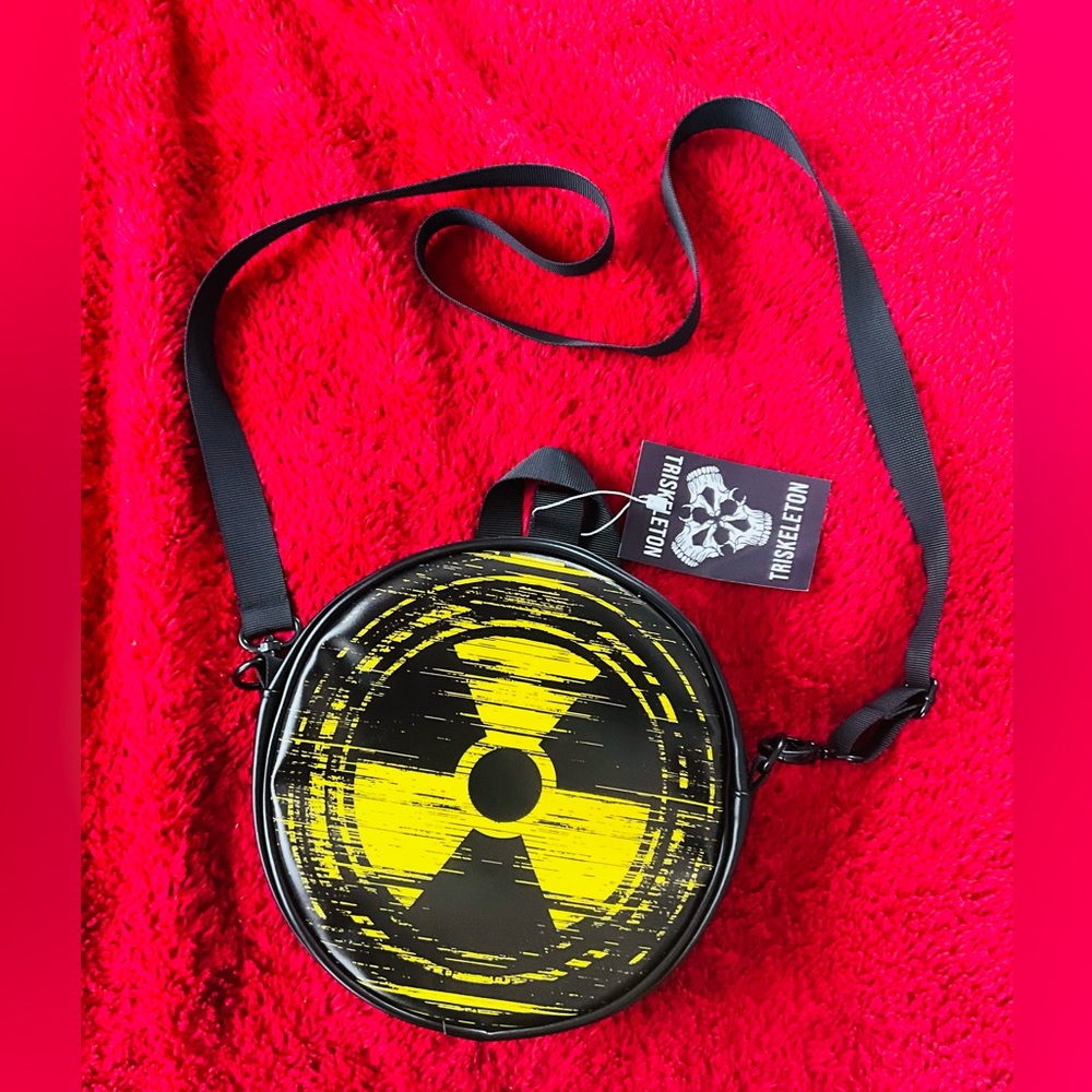 Triskelion Round Crossbody Bag with Yellow Radiation Graphic